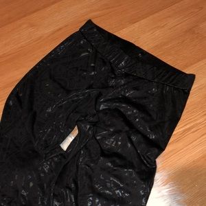 Black leggings white Aztec design.